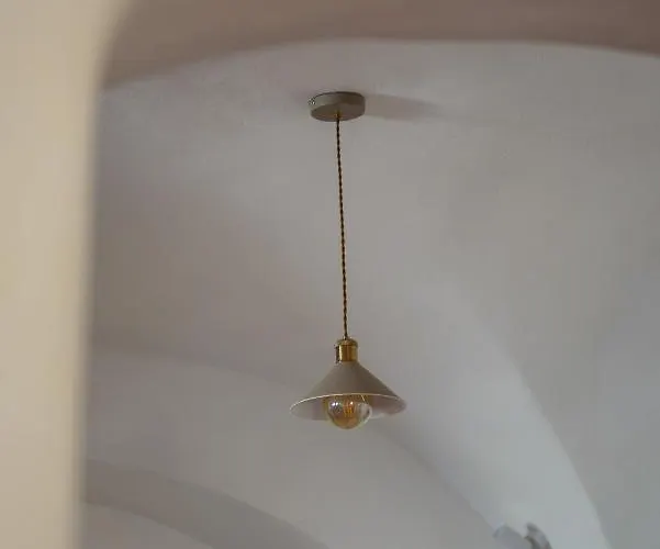 Santorinio Yellow House *